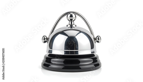 Shiny metallic hotel reception desk bell, service call button with reflection and spotlight, isolated on white background