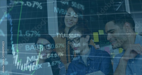 Chart overlay appearing, team gathering around laptop and tablet, pointing and analyzing stocks