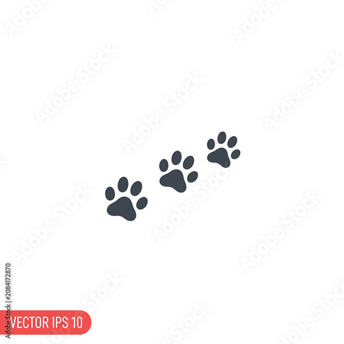Black dog paw prints walking trail.