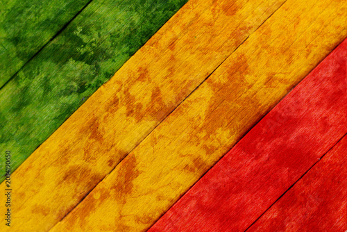 Fotografía Background wood green, yellow, red old retro vintage style, rasta reggae flag