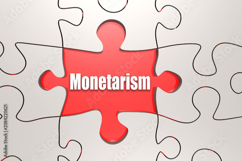 Photos Monetarism word on jigsaw puzzle