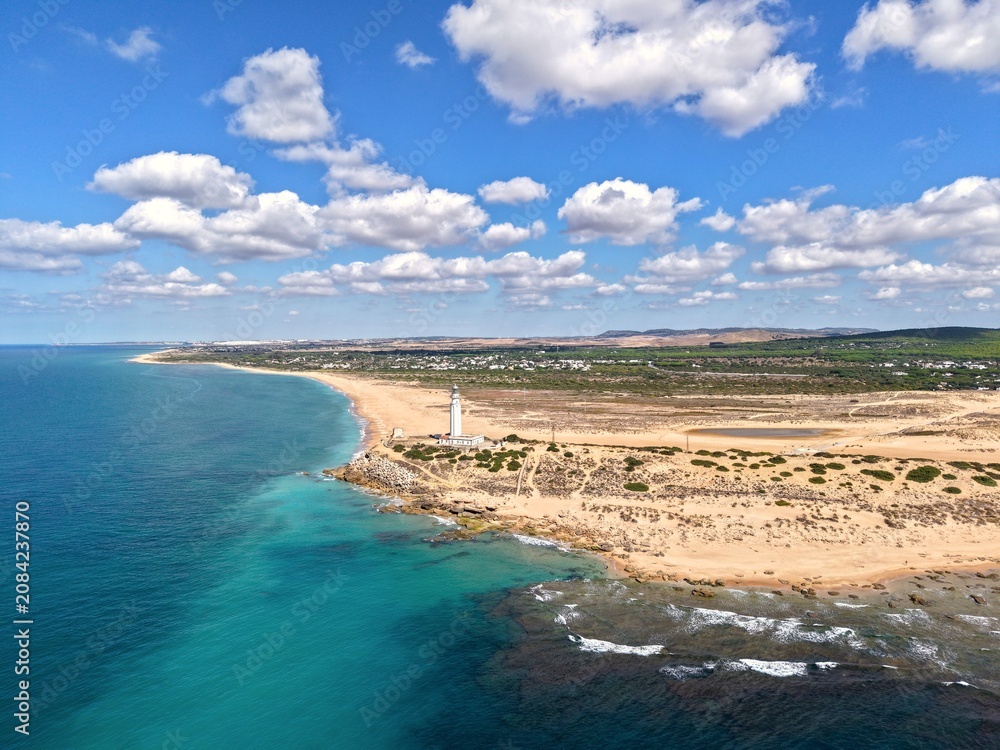 Obraz premium Faro de Trafalgar, aerial view of the lighthouse at a sandy headland with dunes between Los Caños de Meca and Zahora, Conil de la Frontera, Vejer de la Frontera, Costa de la Luz, Andalusia, Spain