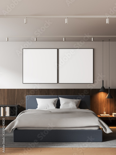 Modern bedroom interior with clean design featuring two blank poster mockups above a neatly arranged bed in soft light creating spacious calm atmosphere. 3D Rendering