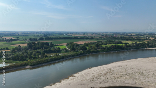 Fotografie Po River in northern Italy showing low water levels exposing dry sand and gravel