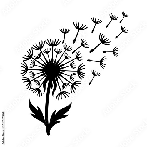 Black silhouette of a dandelion with seeds blowing in the wind