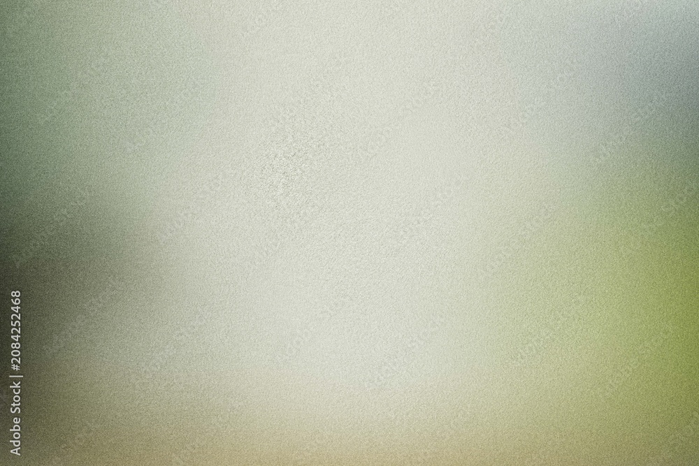 Fototapeta premium Soft green frosted glass texture with gentle diffused light glow
