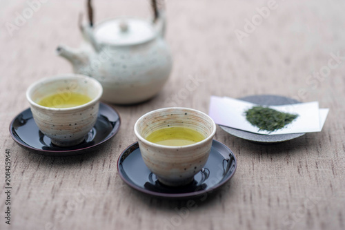 Serene Japanese green tea service with traditional teacup and teapot arrangement