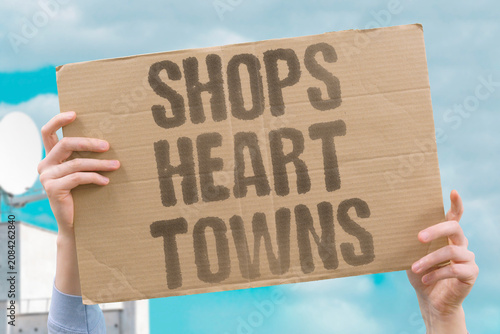 Tableau sur toile "Shops heart towns" Local stores define community character