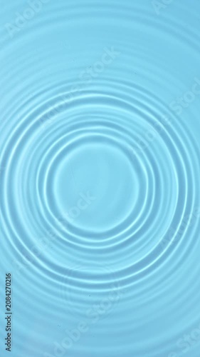 blue water drop falling down in slow motion, water ripples background.	