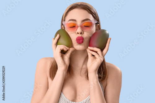 Beautiful young woman with ...