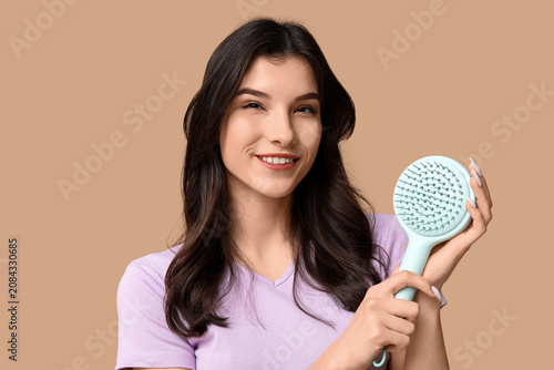Beautiful young woman with ...