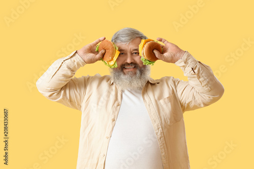 Overweight mature man with ...