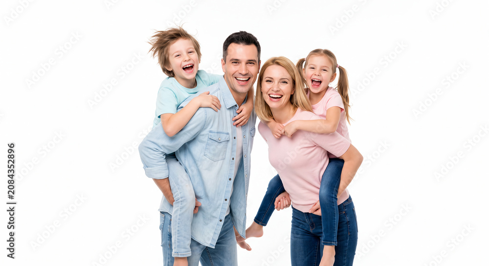 Obraz premium Beautiful picture of family happiness showing mother, father, daughter, and son smiling together in a studio portrait.