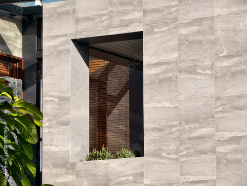 modern stone house exterior, concrete wall