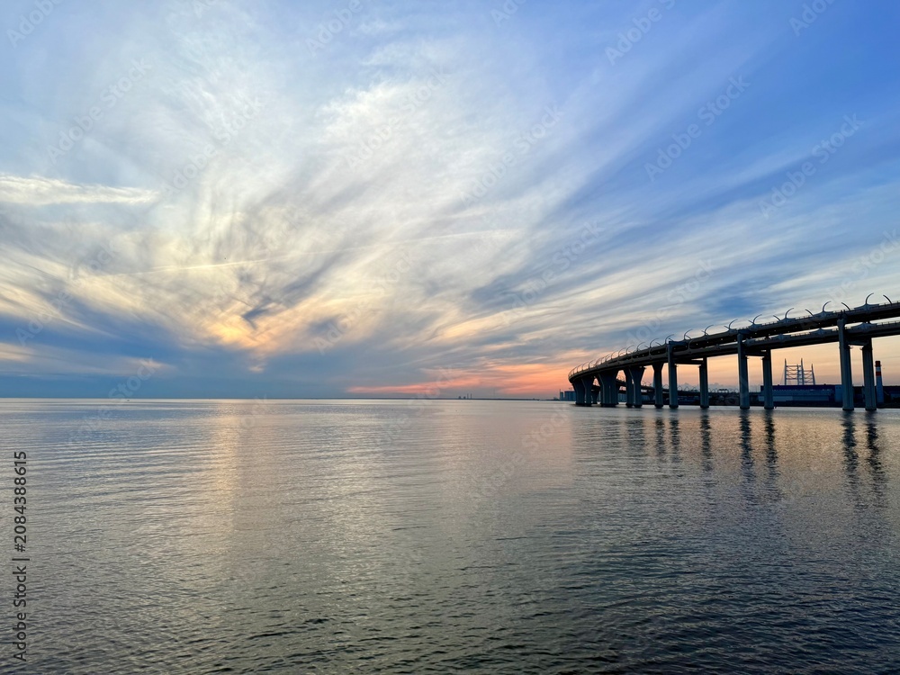 Obraz premium impressive huge bridge in the sunset sea horizon, fantastic sea horizon
