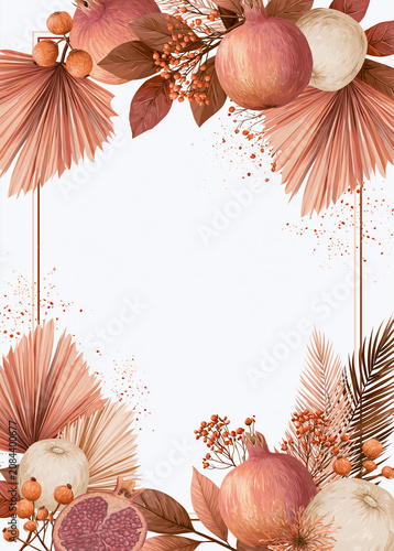 Autumnal pomegranate and dried palm leaf floral frame on white background
