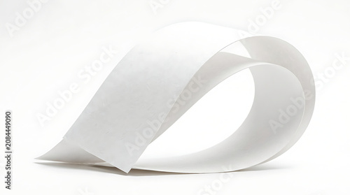 Curled strip of white paper sheet