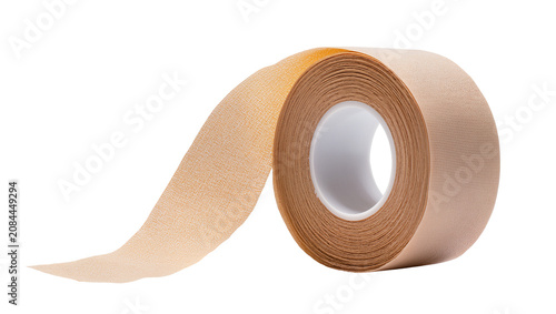 Foto Isolated beige elastic kinesiology tape roll unwound for sports medicine and muscle support therapy