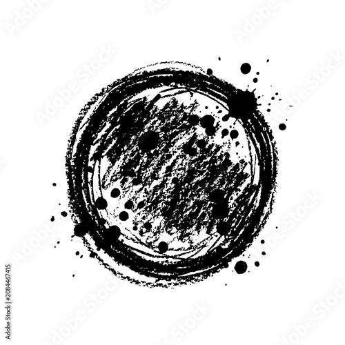 Black ink circle with grunge texture and paint splatters