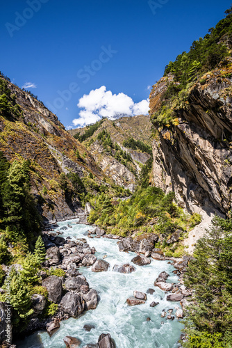 Dudh koshi gorge between Namche bazaar and Tengboche in autumn sunny day. Everest base camp trekking, Himalaya mountains in Khumbu, Nepal.