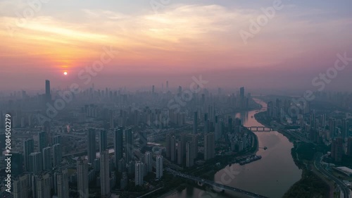 Aerial Timelapse Panorama of Wuhan City Skyline at Sunrise, Yangtze River and Wuhan Yangtze River Bridge at Dawn, Hubei China