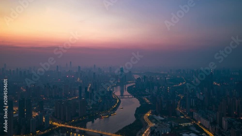 Aerial Timelapse Panorama of Wuhan City Skyline at Sunrise, Yangtze River and Wuhan Yangtze River Bridge at Dawn, Hubei China