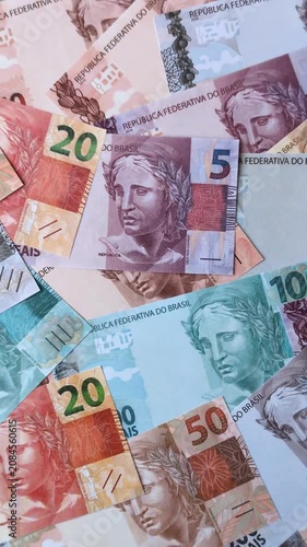 Brazilian paper money, real banknotes as currency for exchange or travel. Brazilian money as a business background