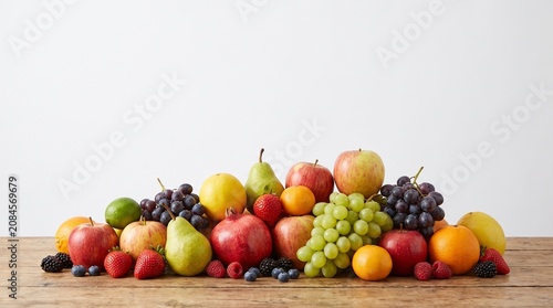 Assortment of Fresh Fruits on a Wooden Table