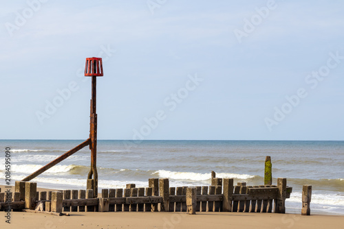 Hazard Marker Posts on Ostend beach Norfolk