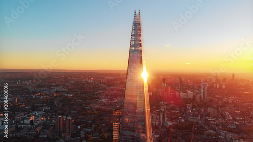 The shard skyscraper reflecting golden london sunset light
