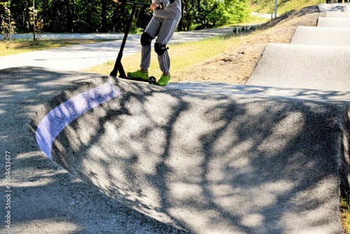 Summer sports. A boy skateboarding on an obstacle course.