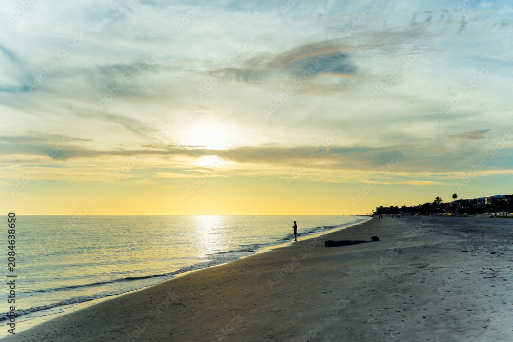 Fototapeta premium St Petersburg, Florida, USA: 07 03 2026: The landscape of saint Petersburg Madeira Beach in Florida at sun set