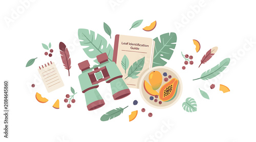 Konstfotografi Bird watching equipment and tropical nature exploration kit with binoculars and field guide