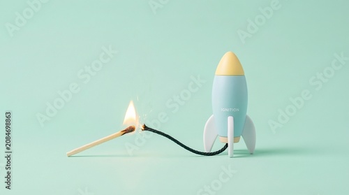 Creative Business Startup Concept Featuring a Toy Rocket and Ignited Fuse for Project Launch