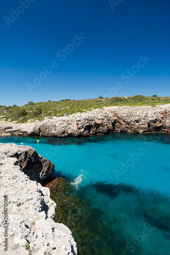 Fotografie Plages et criques de la côte de Minorque, près du village de Binibeca Vell, en Espagne