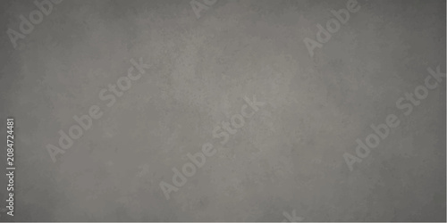 Foto A textured, weathered concrete wall, showcasing a rough, industrial aesthetic with subtle variations in tone and finish, creating a robust and utilitarian backdrop