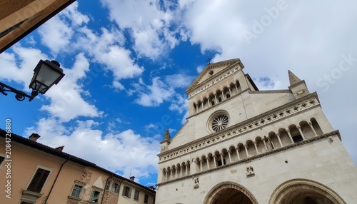 Historic European building with ornate architecture and blue sky.