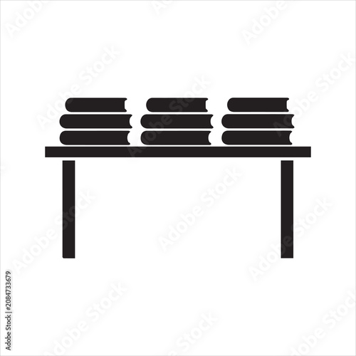 Stack of books on shelf with black and white knowledge education learning