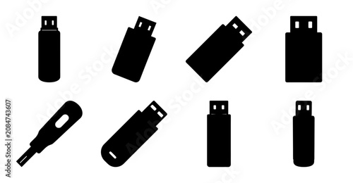 Usb flash drives icon set black and white - Minimalist collection of black and white USB flash drive icons in various shapes and sizes, perfect for tech and digital design projects.