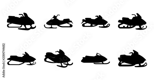Fotografija Black snowmobile and ski-doo vector icons set - A clean set of black silhouette icons featuring snowmobiles and ski-doo vehicles in various riding poses for winter sports or commercial use