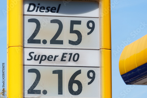 Gas station price tower displaying Super E10 and Diesel fuel rates