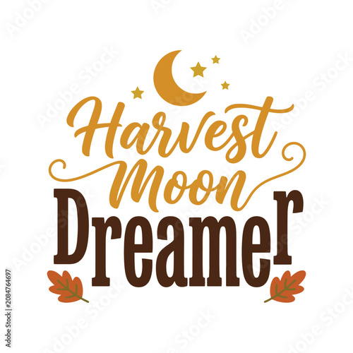 Fotografie Harvest moon dreamer text design with decorative autumn leaves and a crescent mo