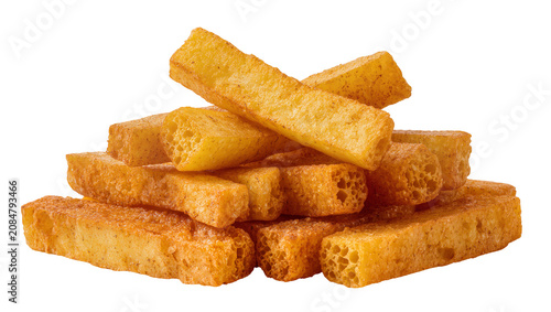 Foto Isolated golden crispy seasoned fried bread sticks or savory croutons for appeti