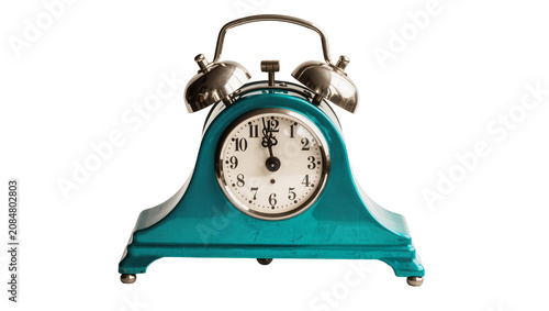 Fotografi Isolated vintage retro alarm clock with silver bells and a glossy teal metallic