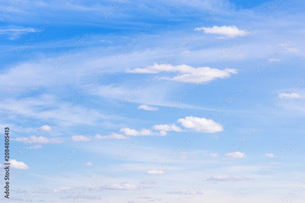 Fototapeta premium cirrus and small cumulus clouds in blue sky