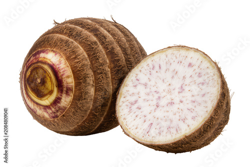 Canvas-taulu Isolated fresh taro root, one whole and one cut to reveal its distinct textured skin and starchy interior