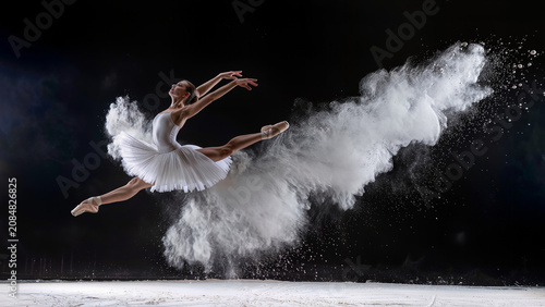 Elegant Ballerina Dancing in Cloud of White Powder Dramatic Action
