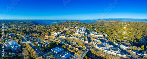 Aerial panoramic photograph of the popular tourist town of Katoomba overlooking the large and picturesque Jamison Valley in the Blue Mountains in New South Wales, Australia