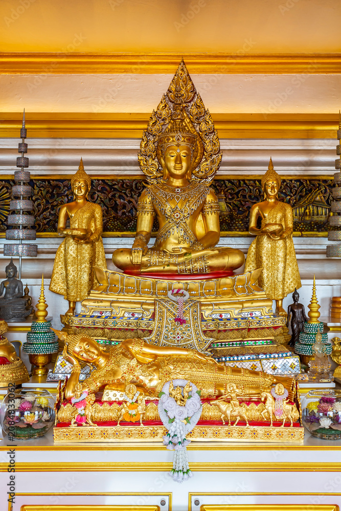 Fototapeta premium Golden Buddha Altar with Multiple Statues Bangkok