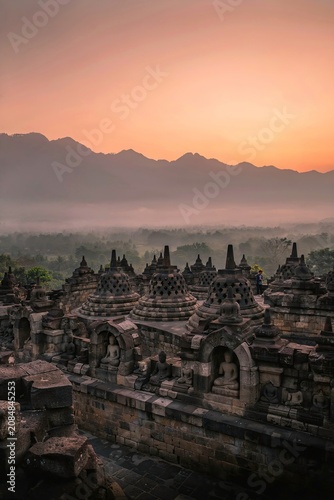 Borobudur Temple at Sunrise with Misty Mountains in Central Java Indonesia
